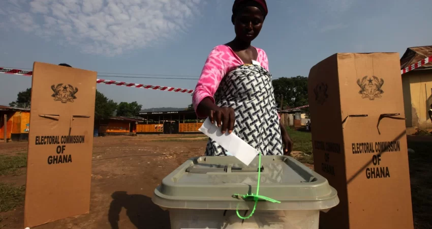 Image of woman voting during elections